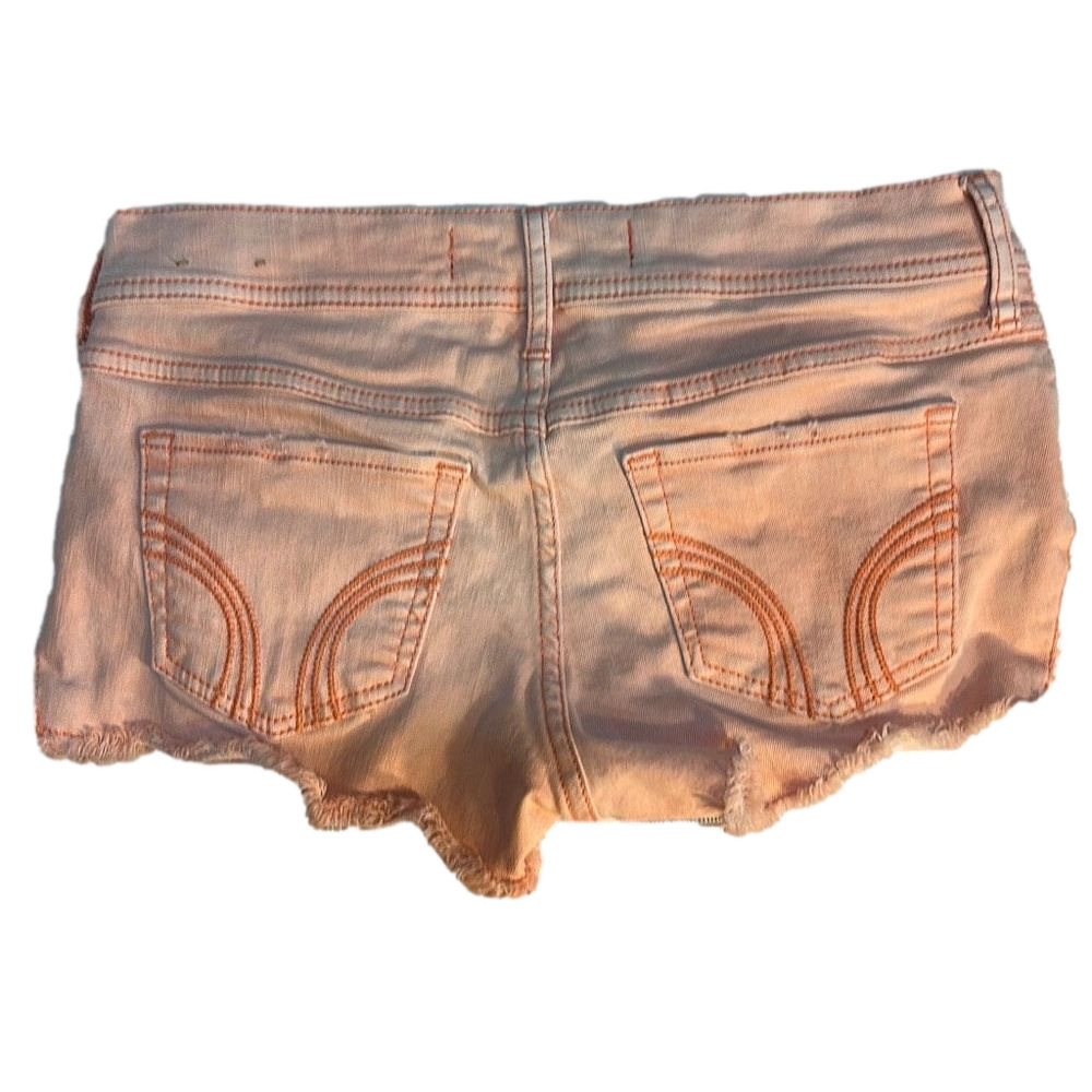 Hollister Short-Shorts Size 3. Waist: 26 inches. Pink with embroidery on hips
